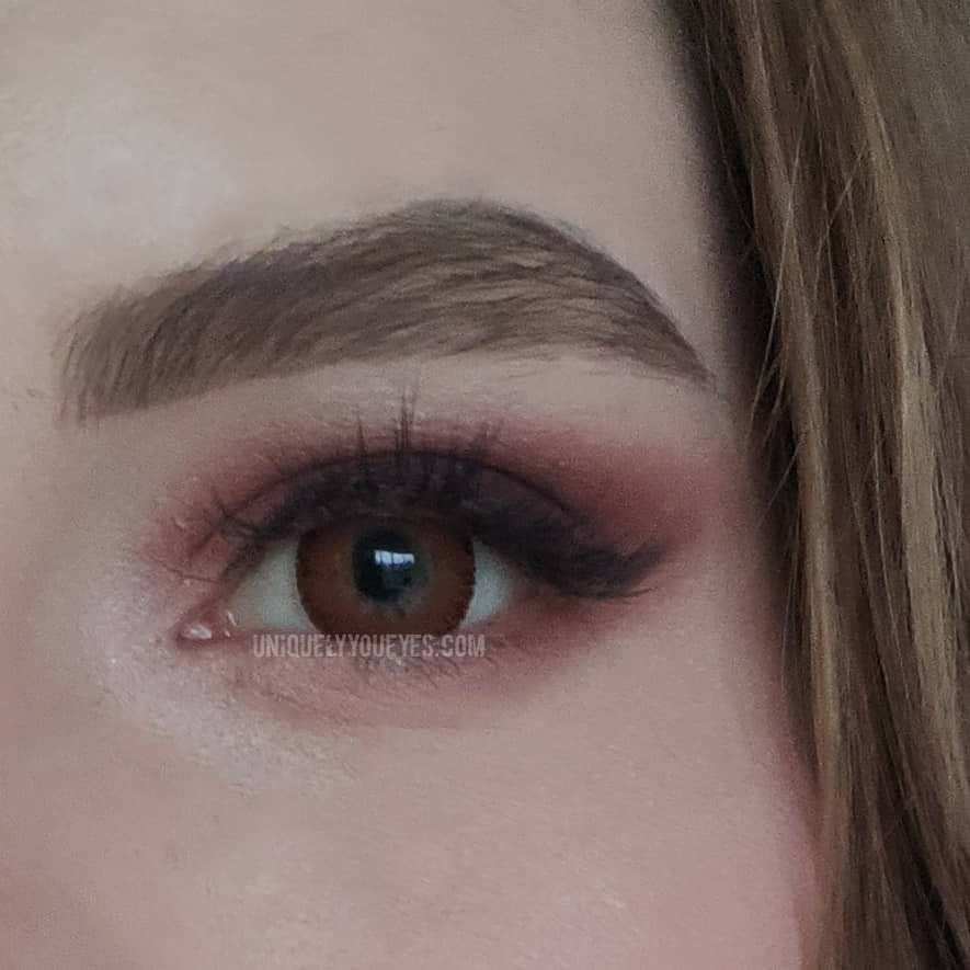 red contacts on dark brown eyes